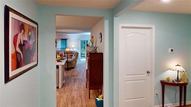 hall featuring light hardwood / wood-style flooring