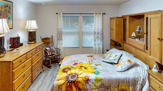 bedroom featuring light hardwood / wood-style flooring