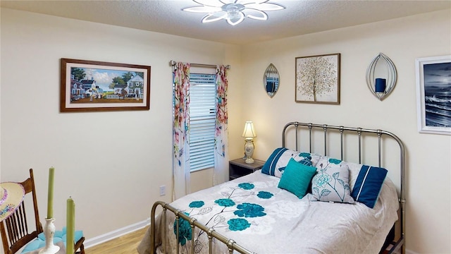 bedroom featuring light wood-type flooring