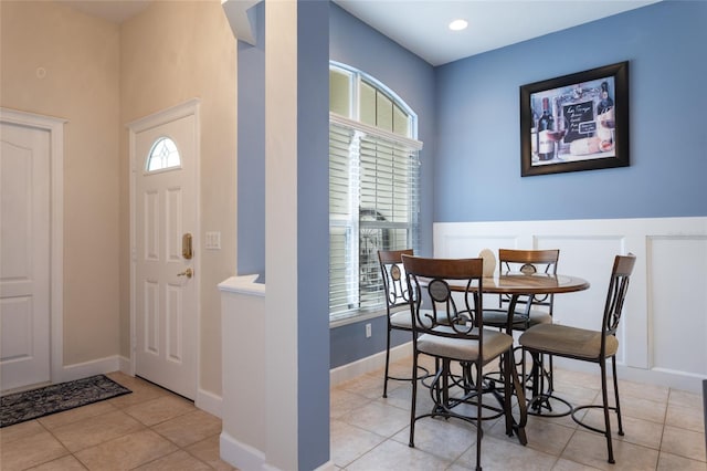 dining space with light tile patterned floors