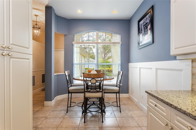 view of tiled dining space