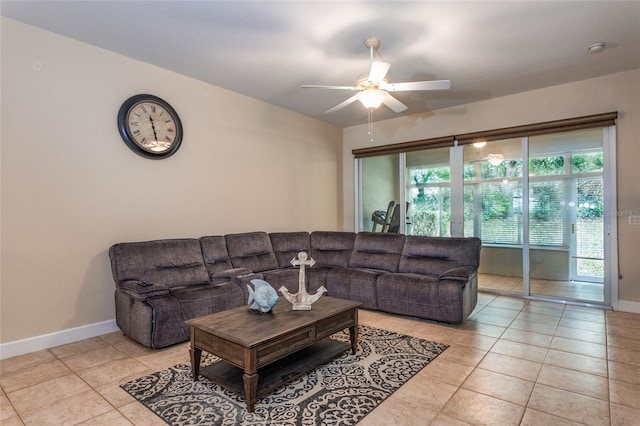 tiled living room featuring ceiling fan