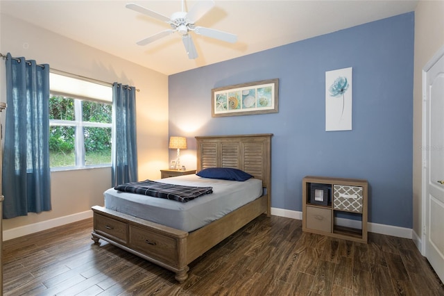 bedroom featuring ceiling fan and dark hardwood / wood-style flooring