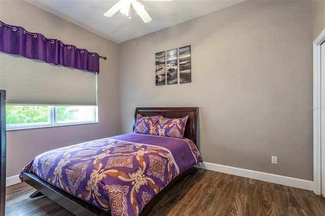 bedroom featuring ceiling fan and hardwood / wood-style flooring