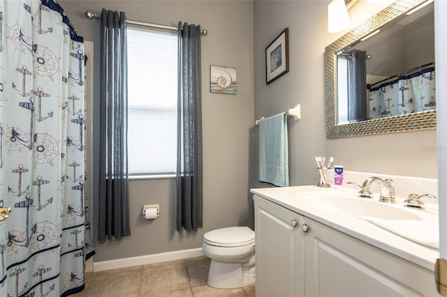 bathroom featuring a shower with curtain, tile patterned floors, vanity, and toilet