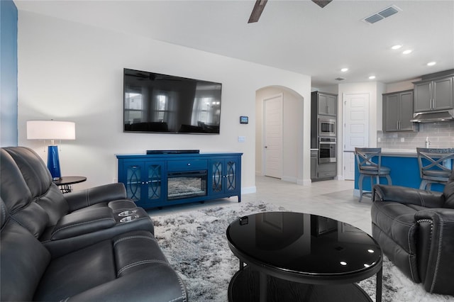 living room with ceiling fan