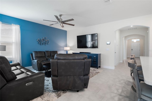 living room with ceiling fan