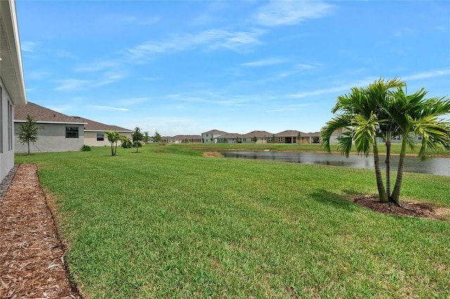 view of yard with a water view