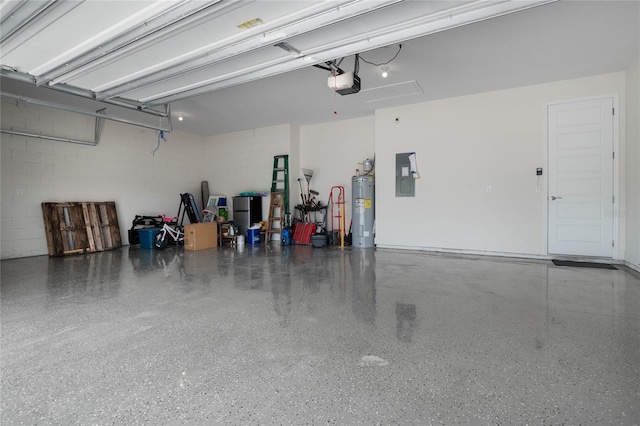 garage with electric panel, water heater, and a garage door opener