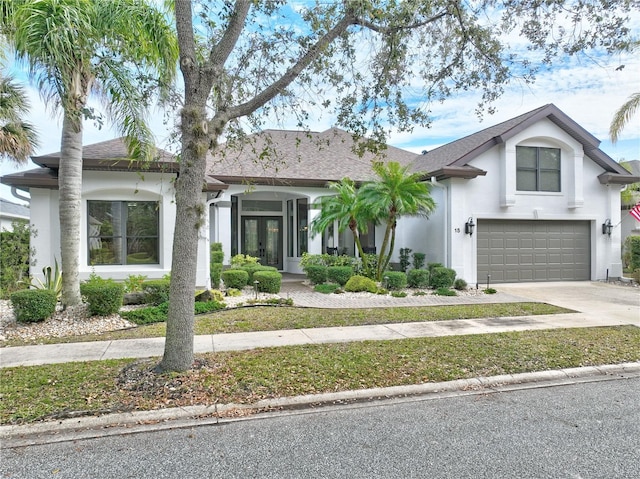 view of front of home with a garage