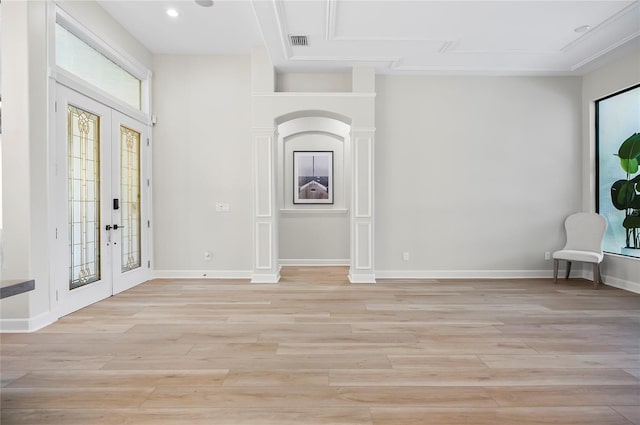 foyer entrance featuring light wood-type flooring and french doors