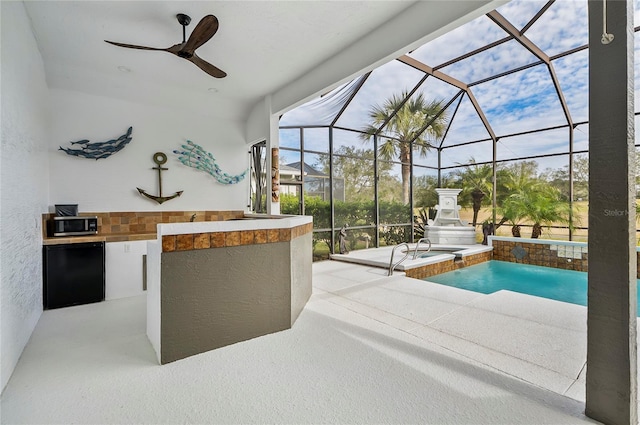 view of pool featuring a patio area, glass enclosure, and area for grilling