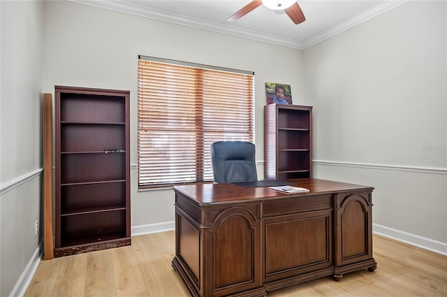 office space with ceiling fan, ornamental molding, and light hardwood / wood-style floors