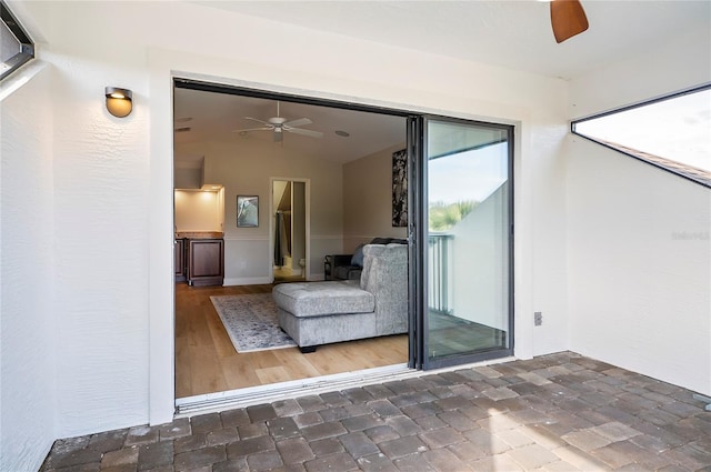 interior space featuring ceiling fan