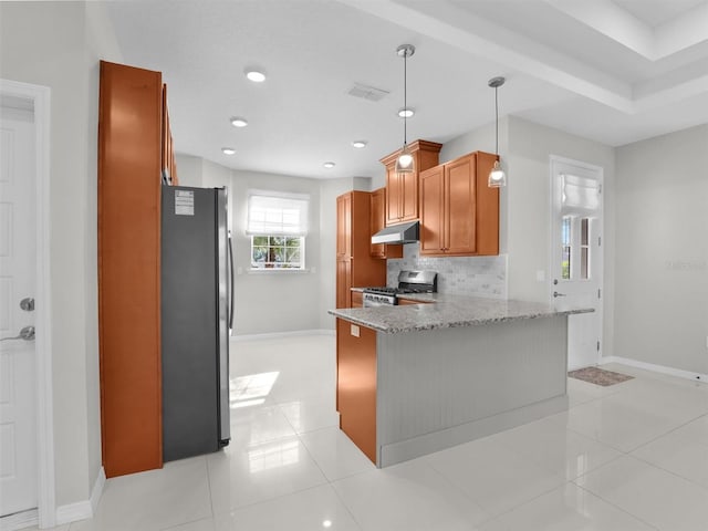 kitchen with light tile patterned floors, stainless steel appliances, tasteful backsplash, light stone countertops, and kitchen peninsula