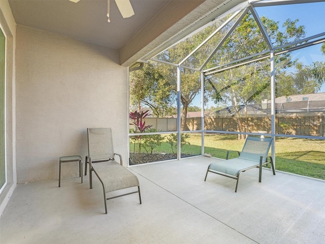 sunroom / solarium with ceiling fan