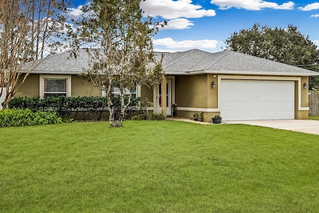 view of front facade featuring a garage and a front yard