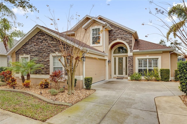 view of front of home with a garage