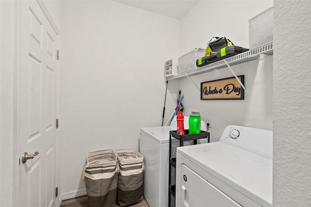 laundry room with washing machine and clothes dryer