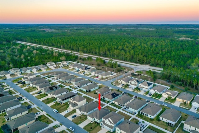 view of aerial view at dusk