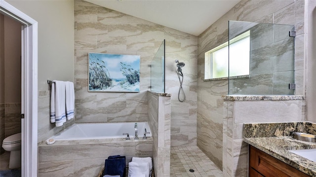 full bathroom with toilet, vanity, separate shower and tub, and vaulted ceiling