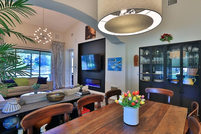 dining space with a chandelier