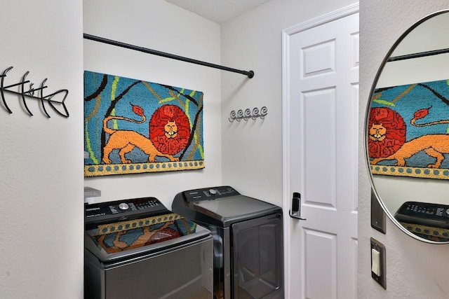 laundry area featuring washer and clothes dryer