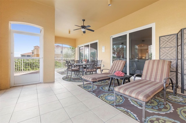 view of patio featuring ceiling fan