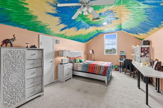 bedroom featuring ceiling fan, vaulted ceiling, and light carpet