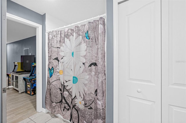 bathroom featuring tile patterned flooring