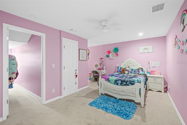 carpeted bedroom with ceiling fan