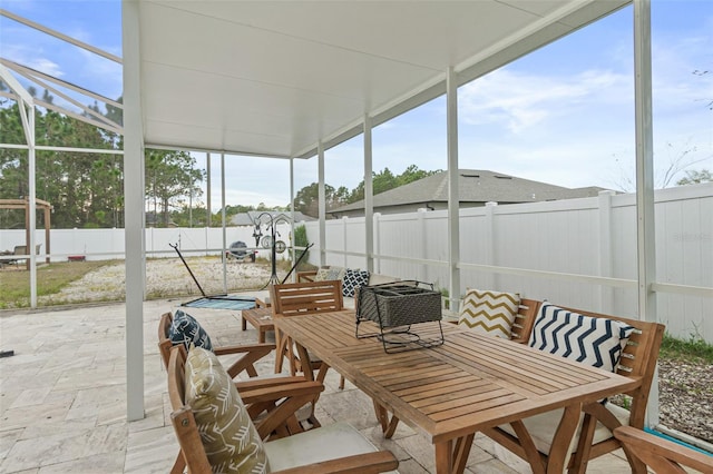 sunroom / solarium featuring plenty of natural light