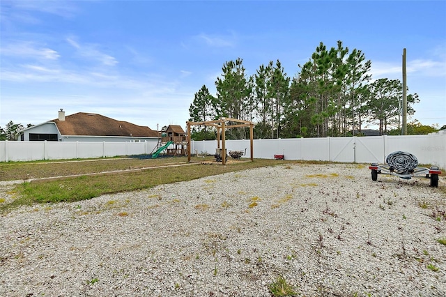 view of yard featuring a playground