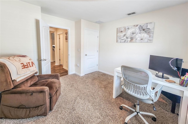 view of carpeted office space