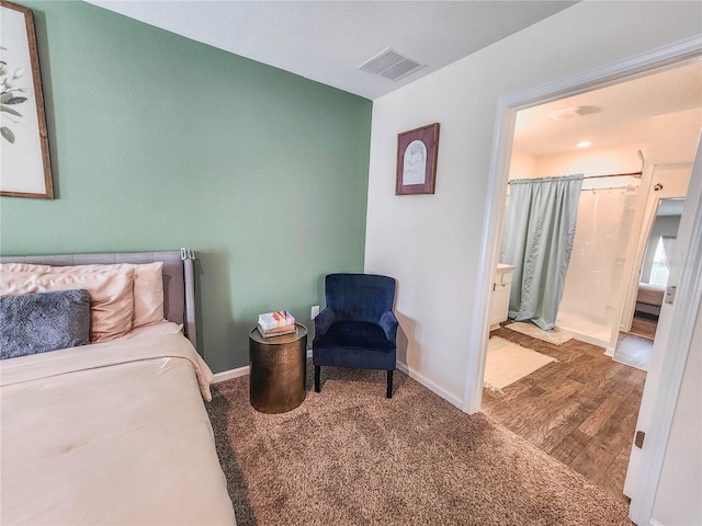 bedroom featuring hardwood / wood-style flooring