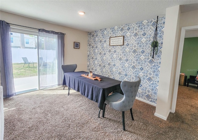 view of carpeted dining space