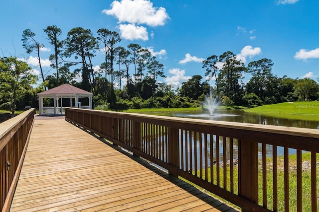 wooden terrace with a gazebo and a water view