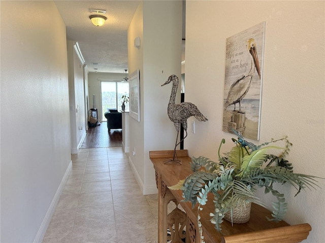 75 Riverview Bnd S Unit 1633, Palm Coast, FL 32137 - hall featuring light tile patterned floors and baseboards