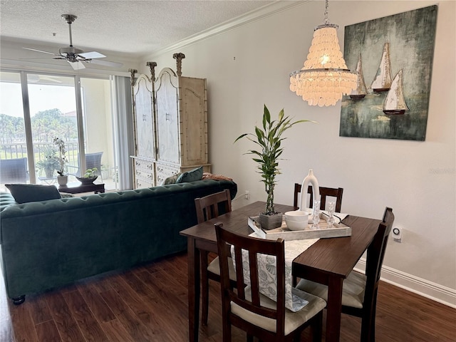 75 Riverview Bnd S Unit 1633, Palm Coast, FL 32137 - dining area featuring dark wood finished floors, a ceiling fan, a textured ceiling, crown molding, and baseboards