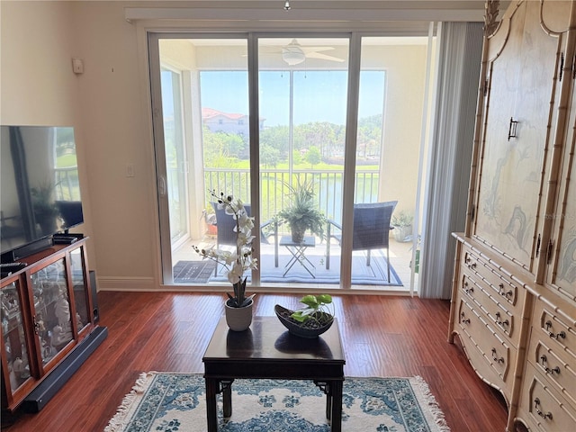 75 Riverview Bnd S Unit 1633, Palm Coast, FL 32137 - living area featuring ceiling fan, dark wood-style flooring, and baseboards