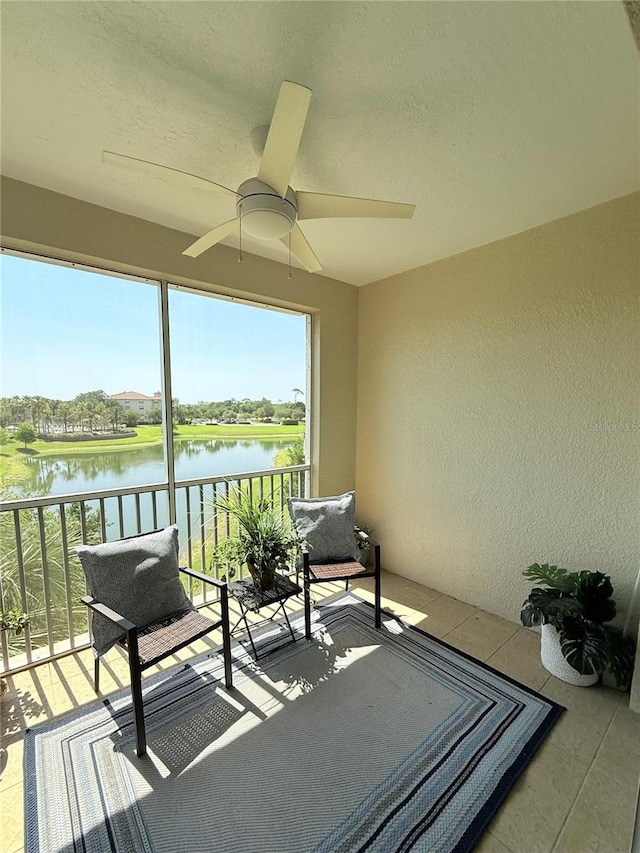 75 Riverview Bnd S Unit 1633, Palm Coast, FL 32137 - sunroom / solarium with a water view and ceiling fan