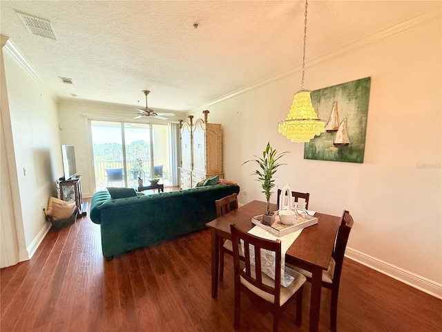 75 Riverview Bnd S Unit 1633, Palm Coast, FL 32137 - dining area featuring crown molding, wood finished floors, baseboards, a textured ceiling, and a ceiling fan