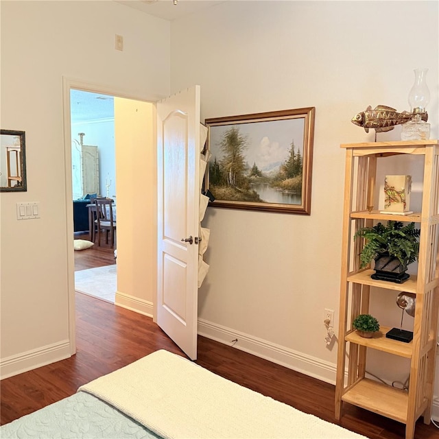 75 Riverview Bnd S Unit 1633, Palm Coast, FL 32137 - bedroom with dark wood-style floors and baseboards