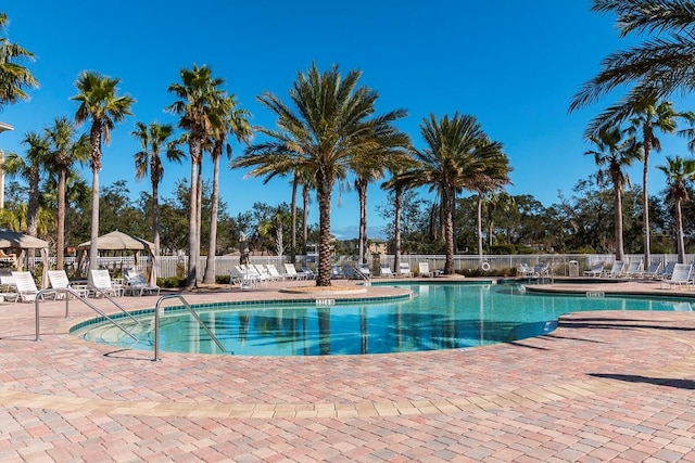 75 Riverview Bnd S Unit 1633, Palm Coast, FL 32137 - community pool with fence and a patio area