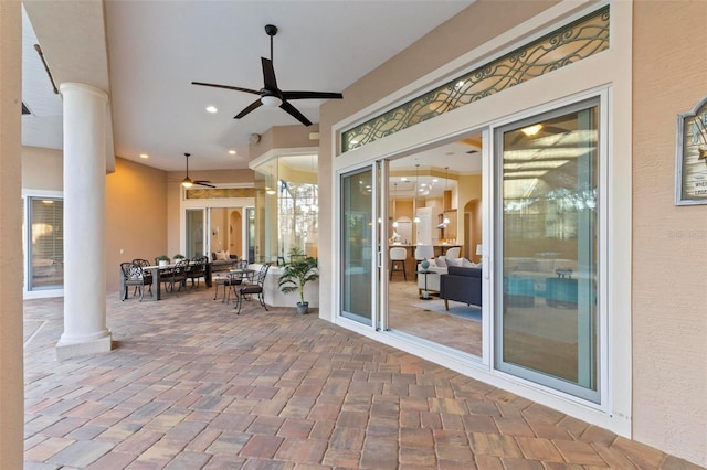 view of patio featuring ceiling fan