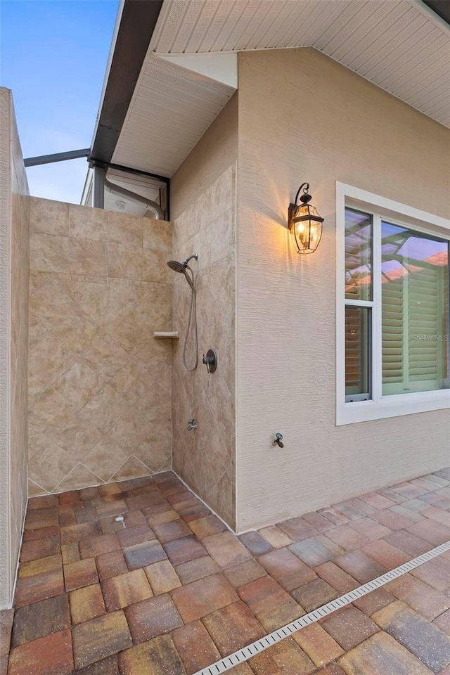 exterior space with tiled shower