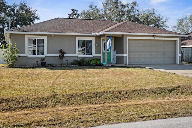 single story home with a front yard and a garage