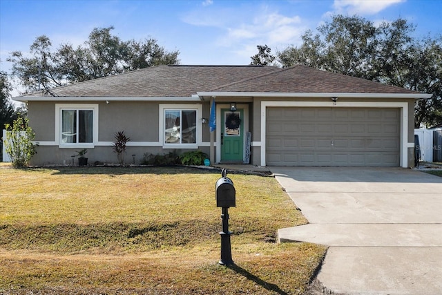 ranch-style house with a front yard and a garage