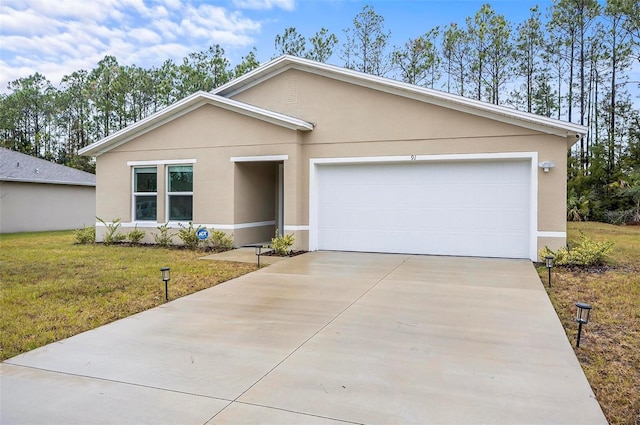 single story home with a garage and a front yard