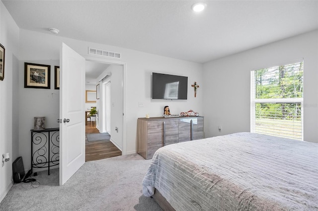 bedroom featuring carpet